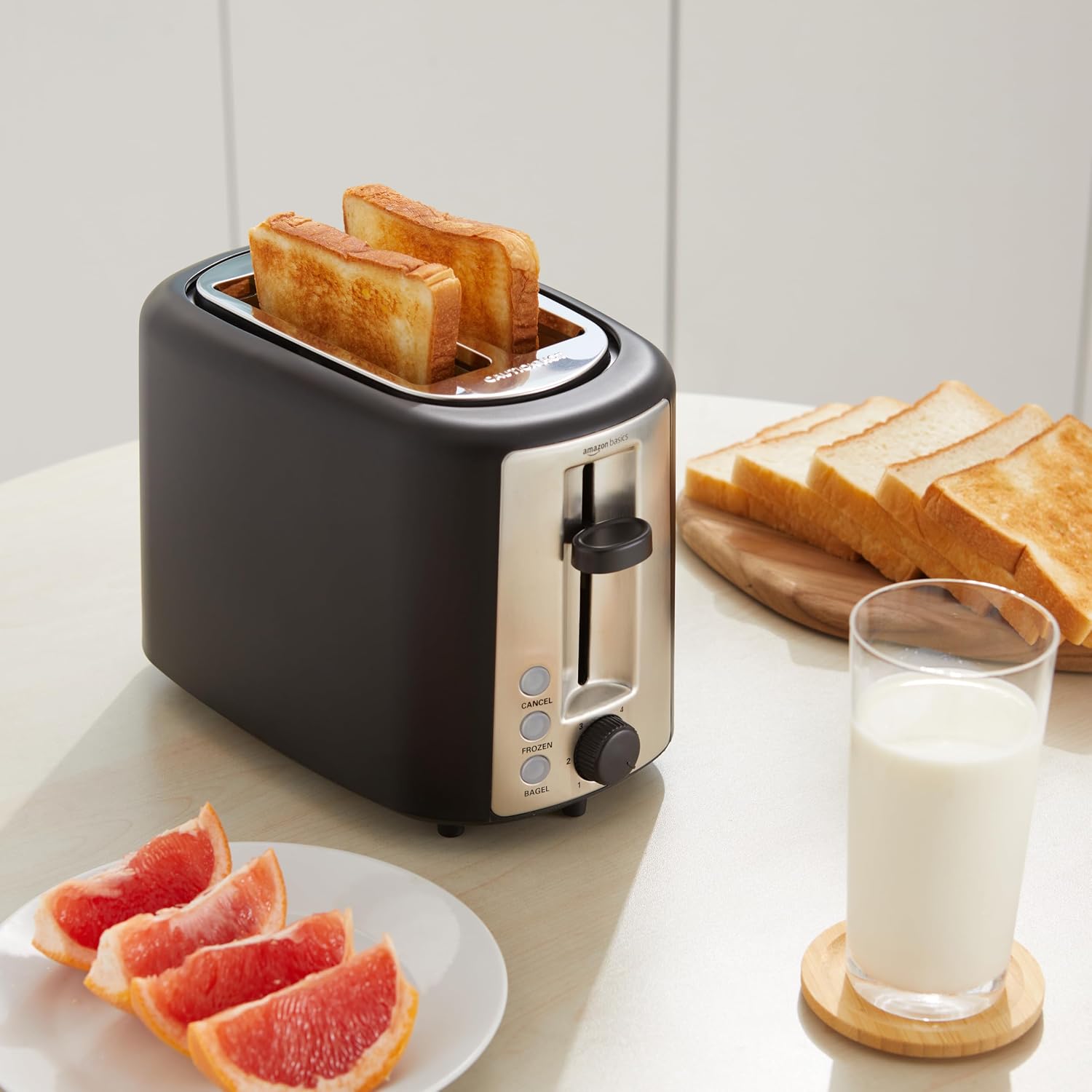 Amazon Basics 2 Slice Toaster, Extra Wide Slots for Bagels, 6 Browning Settings, Removable Crumb Tray, Defrost/Cancel/Bagel Buttons, Cord Wrap, 900W, Black & Silver - Image 5