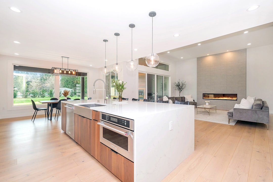A beautifully designed modern kitchen with functional layout, stylish surfaces, and organized storage.