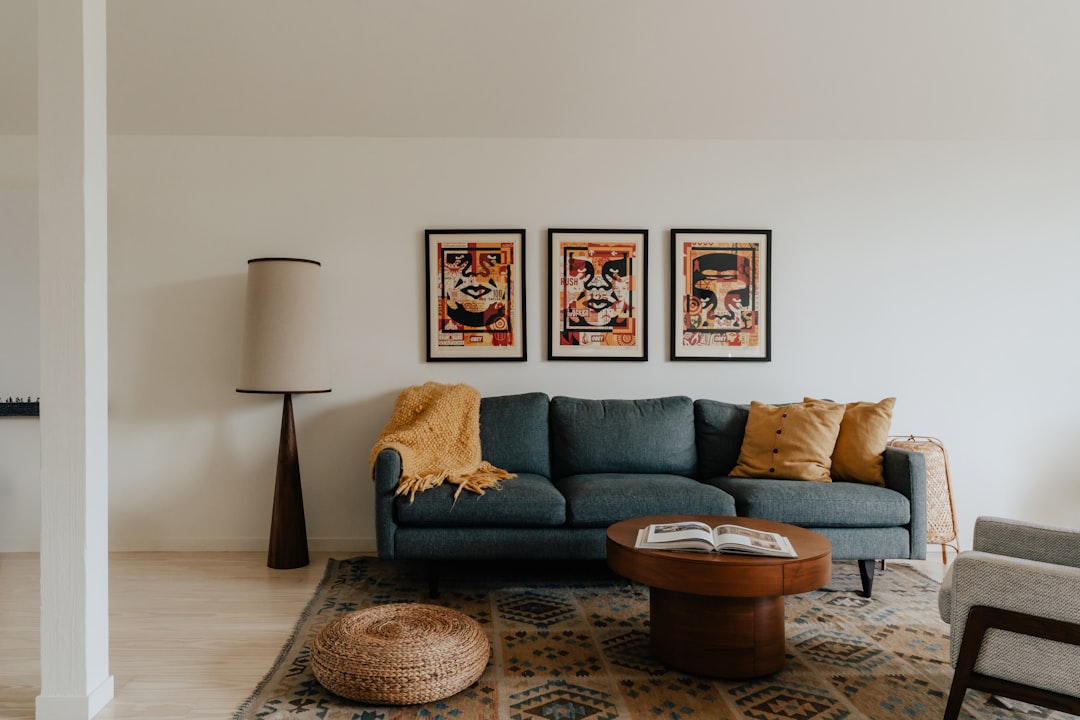 A beautifully styled living room that combines modern furniture with traditional decor elements, showcasing a harmonious blend of contemporary and classic design.