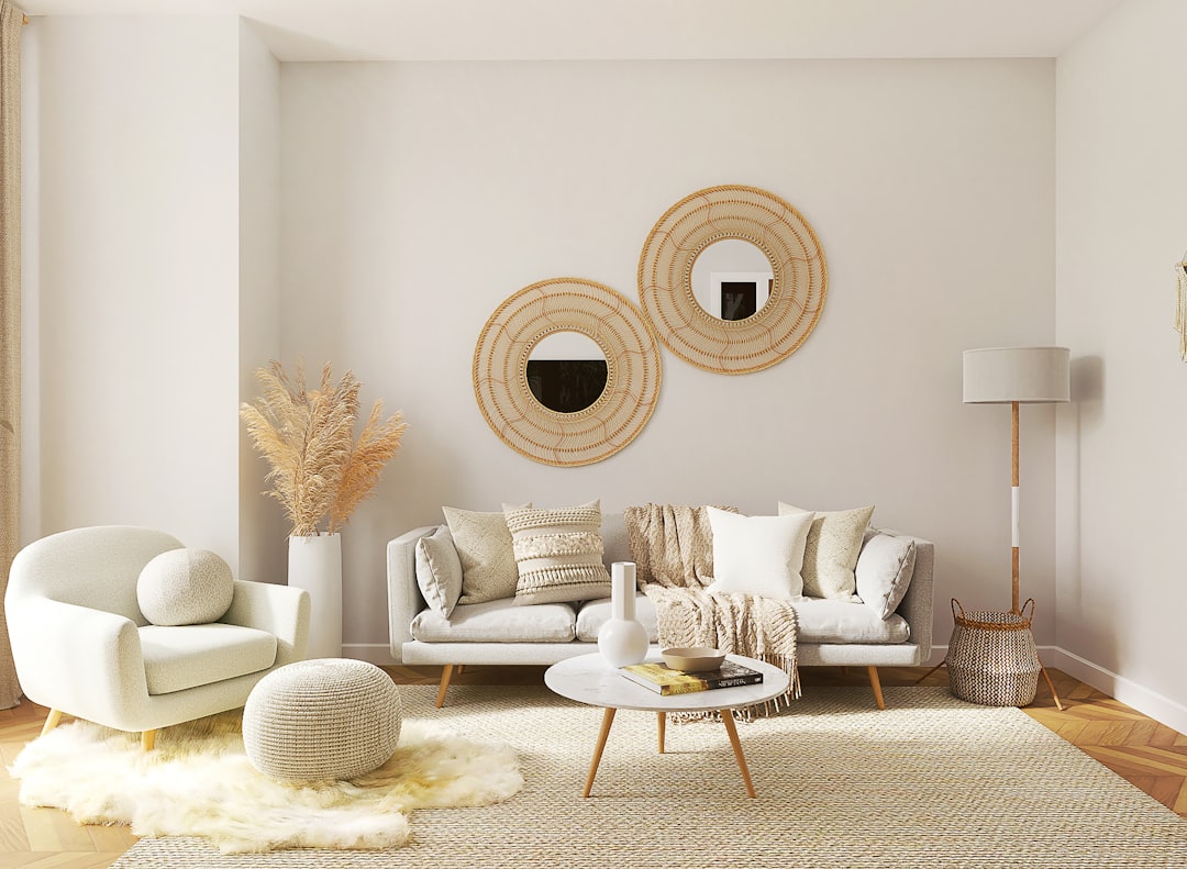 A cozy living room with simple decor elements like plants, cushions, and artwork that enhance the space's ambiance.